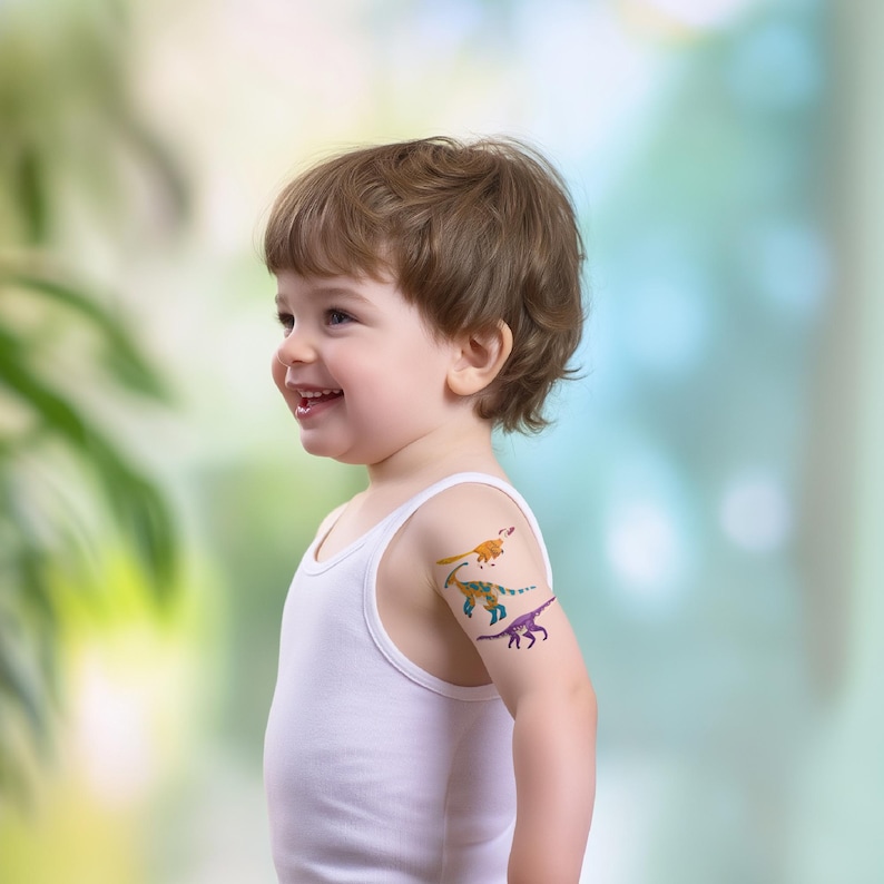 Boy Wearing Dinosaur Temporary Tattoos Set. Dino Birthday Party Activity and Favors.