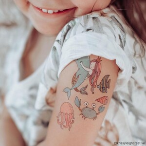 Girl Wearing Mermaid Party Temporary Tattoo Transfers For Kids. Under The Sea Themed Body Stickers. Birthday Party Favors.