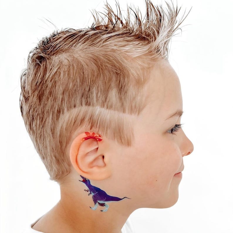 Boy Wearing Dinosaur Party Temporary Tattoos. Dino Birthday Favors. Body Stickers. Gifts For Kids.