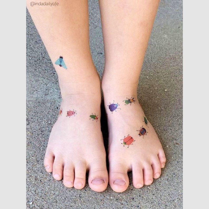 Kid wearing bugs temporary tattoo transfers. Set of 36 tiny beetles body stickers for kids.