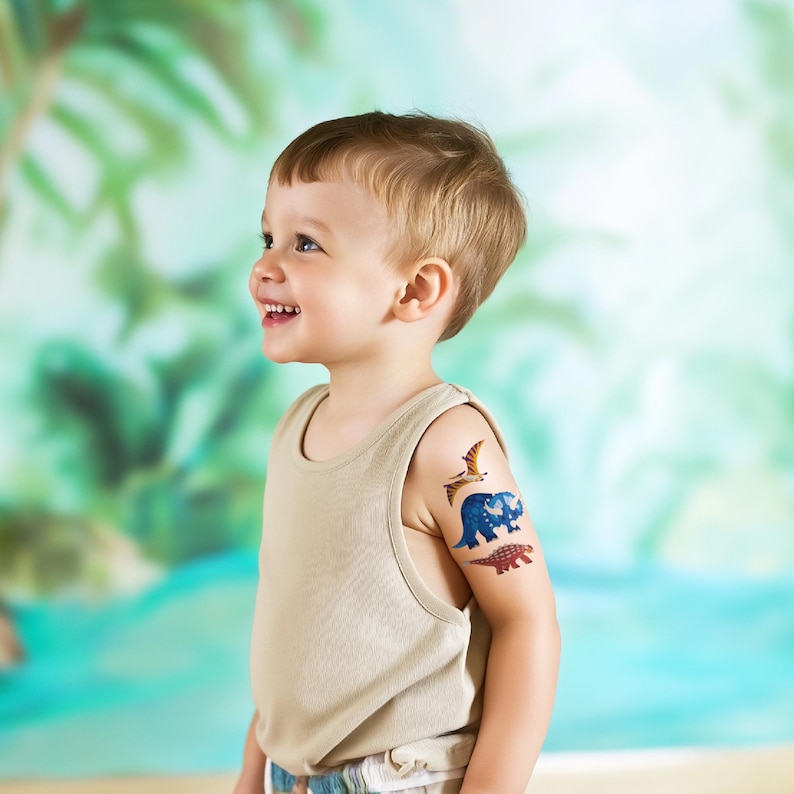 Boy Wearing Dinosaur Temporary Tattoos Set. Dino Birthday Party Activity and Favors.