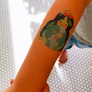 Boy Wearing Mother Earth Temporary Tattoo Transfers. Set of 3 Body Stickers. Earth Day Party Fake Tattoos To Promote Harmony With Nature.