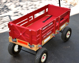 Tushions - Wagon cushions, wagon pads, with seatbelt(s), or with harness.