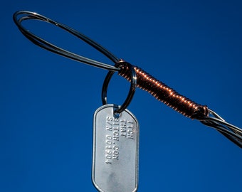 Knuckles Back Scratcher, a hand made stainless steel personal back scratcher with unique serial number and lifetime warranty