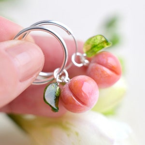 Lampwork glass peach earrings on silver circle hoops