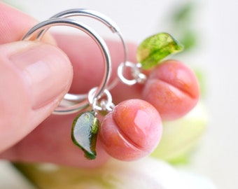 Lampwork glass peach earrings on silver circle hoops