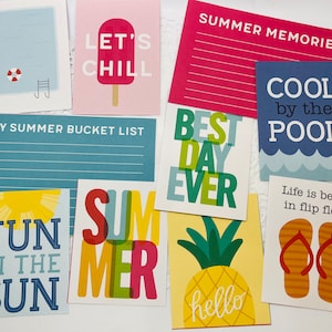 May include: A set of ten colorful cards with summer-themed illustrations and text. The cards feature phrases like "Let's Chill", "Fun in the Sun", "Summer Memories", "Cool by the Pool", and "Best Day Ever".