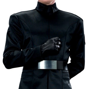 May include: A black officer's uniform with a high collar and a silver belt buckle. The uniform is worn by a person with their right hand clenched into a fist.