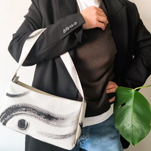 The bag helps to create absolutely unique outfits and will be a great accent.