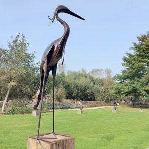 metal heron, metal art, yard art, this heron is made from oil drums, handcrafted in Zimbabwe, it makes a great addition to your garden.  each heron comes with 2 hooks to secure them in the soil. Can also be placed on a terrace, veranda...