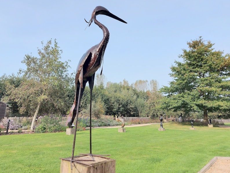 metal heron, metal art, yard art, this heron is made from oil drums, handcrafted in Zimbabwe, it makes a great addition to your garden.  each heron comes with 2 hooks to secure them in the soil. Can also be placed on a terrace, veranda...