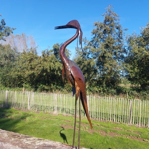 metal heron, metal art, yard art, this heron is made from oil drums, handcrafted in Zimbabwe, it makes a great addition to your garden.  each heron comes with 2 hooks to secure them in the soil. Can also be placed on a terrace, veranda...