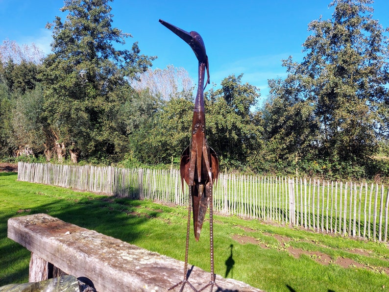 metal heron, metal art, yard art, this heron is made from oil drums, handcrafted in Zimbabwe, it makes a great addition to your garden.  each heron comes with 2 hooks to secure them in the soil. Can also be placed on a terrace, veranda...
