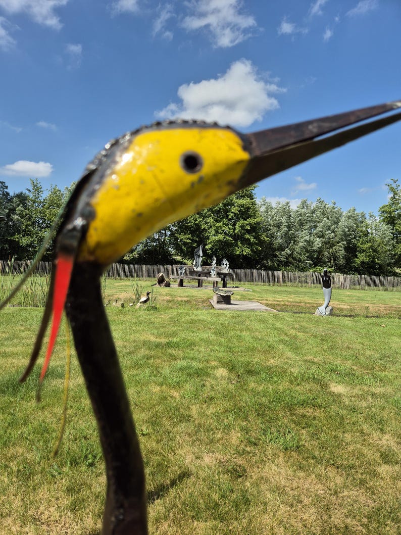 colourful heron sculpture, garden statue, metal art, made from oil barrels, oil drums, signs of used metal, yard art, bird watcher, bird lover, great gift