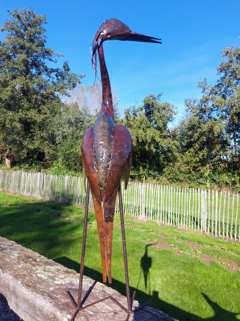 metal heron, metal art, yard art, this heron is made from oil drums, handcrafted in Zimbabwe, it makes a great addition to your garden.  each heron comes with 2 hooks to secure them in the soil. Can also be placed on a terrace, veranda...