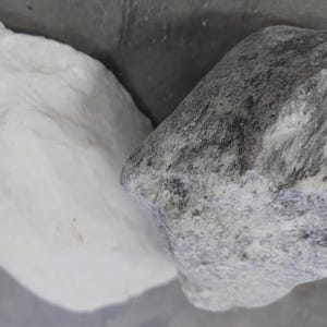 2 chunks of soapstone, 1 black/white soapstone and 1 white soapstone, 3 to 4 kg stone, soft stone for carving, black and whitesofr  rocks