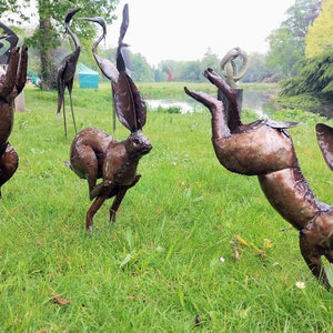 garden sculpture, set of 3 hares, handcrafted  from recycled metal, handmade in Zimbabwe, yard art, metal art, playful hares or rabbits