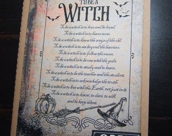 May include: A vintage-style notebook cover with a black and white illustration of a witch and a quote about the qualities of a witch. The cover has a distressed, aged look with a brown background and orange accents. The text on the cover reads "To be a witch is to love and be loved. To be a witch is to harm none. To be a witch is to know the ways of the old. To be a witch is to see beyond the barriers. To be a witch is to follow themcen. To be a witch is to be one with the gods. To be a witch is to study and to learn. To be a witch is to be the teacher and the student. To be a witch is to acknowledge the truth. To be a witch is to live with the Earth, not just in it. To be a witch is to know, to dare, to will, and to keep silent." The cover also has a black and white illustration of a witch's hat and a broom. The cover has a black label that reads "Open if you dare."