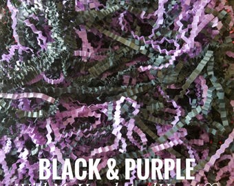 May include: Close-up of black and purple crinkle paper. The image features shredded paper in shades of black and purple, with the text "BLACK & PURPLE WithMyHandsAndHeart". This decorative filler is ideal for gift packaging.