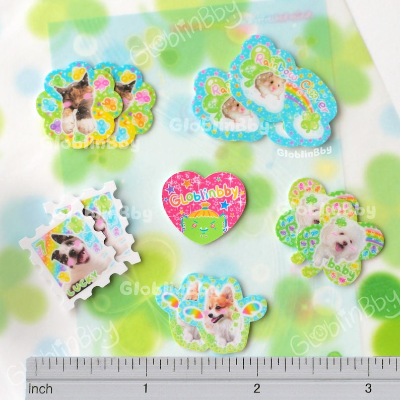 Mini clover animal sticker flakes on a clover memo. The stickers are between 0.6 and 1.2 inches wide.