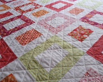 Colcha Cuadrados Simples es una colcha casera con tejidos orgánicos de Monaluna,