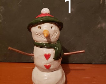 Snowmen with copper arms