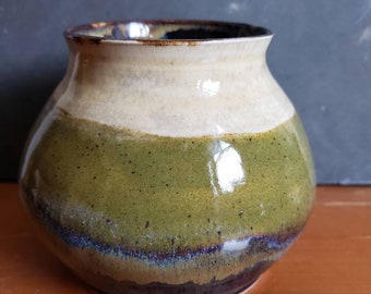 Small green and cream vase