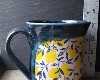 Lemons with blue leaves mug