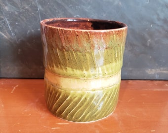 Green and brown brush holder