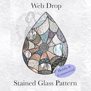 May include: A stained glass pattern of a teardrop shape with a web design in shades of blue, grey, and pink. The pattern is labelled "Web Drop" and "Stained Glass Pattern".