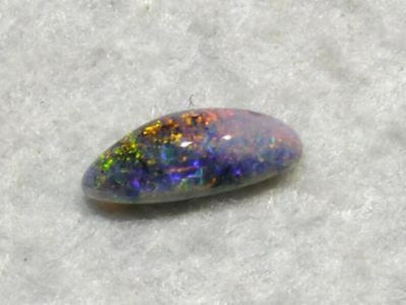 Black opal multi coloured Red Blue Green freeform 0.72ct Australian Opal