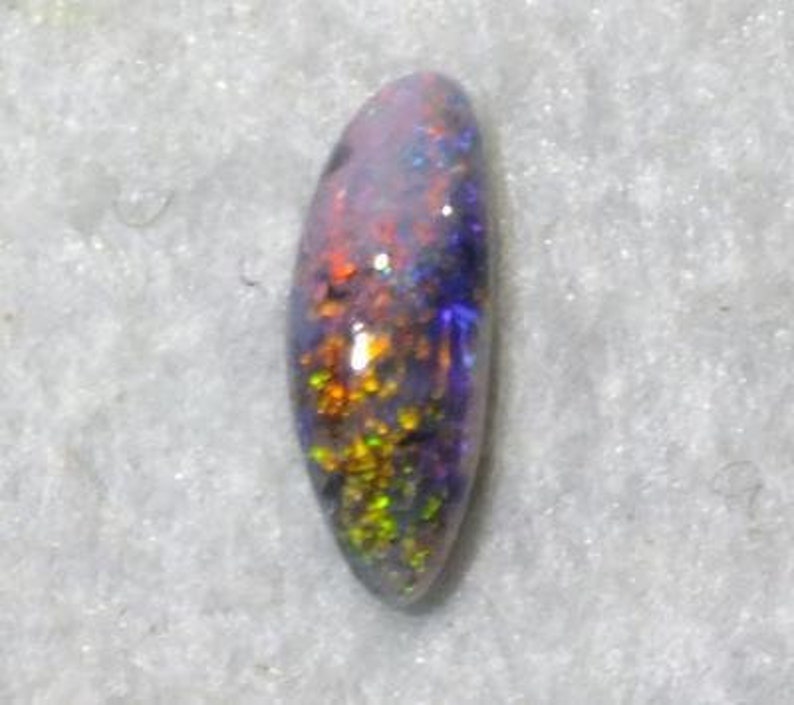 Black opal multi coloured Red Blue Green freeform 0.72ct Australian Opal