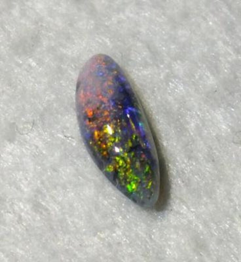 Black opal multi coloured Red Blue Green freeform 0.72ct Australian Opal