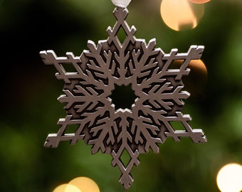 Silver snowflake metal Christmas ornament, winter solstice gift