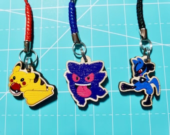 Pokemon Chibi Wooden 1" Cell Phone, Zipper Pull, or DS Charms! Dust Plugs available for iPhone and Android!