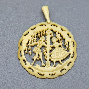 An Amazing Antique pendent  pearl-hued made with delicate sawing work organic material
