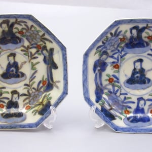 Two  Chinese antique Eggshell (19th century) porcelain octagonal small saucers. Decorated with Jinni  on a cloud and potted flowers