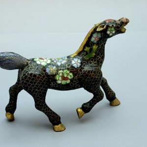 Vintage Chinese Cloisonné&#39; small horse, black, decorated with floral elements.