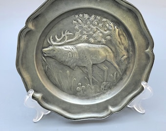 Antique decorative pewter plate caring relief of deer in nature. 22 cm Marked!
