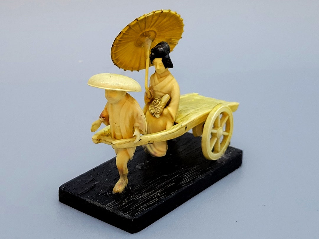 Vintage Japanese Celluloid Miniature Figurine of a Rickshaw Man Driving