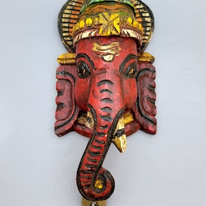 Vintage Indian Ganesh wood mask with bell to keep the demons away. original Indian hand made wood mask of Ganesh