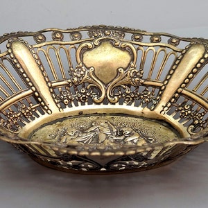 An antique German 800 silver basket, circa 1900, handcrafted with hammering and sawing
