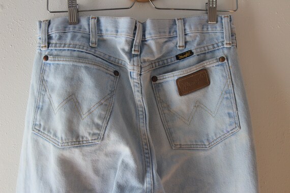 Light wash Wranglers - 32'' waist