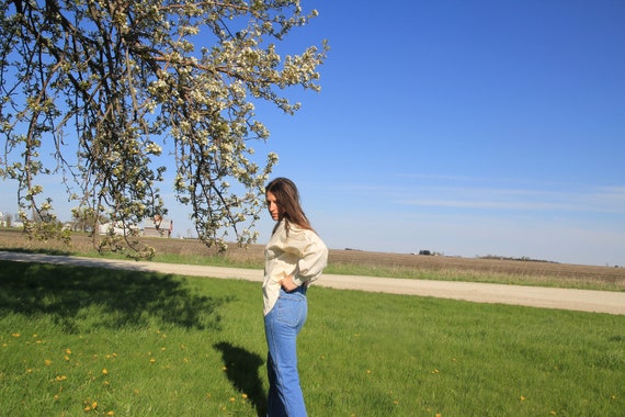 medium wash 28'' waist Wranglers