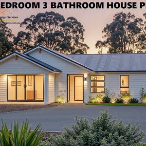 May include: Exterior view of a modern, single-story house plan. The house features a white exterior, dark trim, and a corrugated metal roof. Large windows and glass doors provide ample natural light. The text at the top reads "2 BEDROOM 3 BATHROOM HOUSE PLAN."