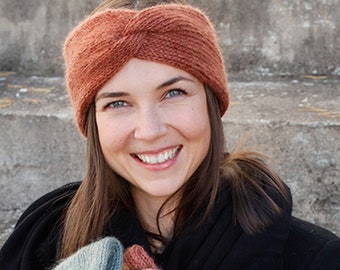 Winter Smiles Headband Knitted head band with cable in DROPS Alpaca and DROPS Kid-Silk. Sizes S - XL.