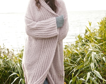 Hand-knitted coat, loose-fitting coat with shawl collar. oversized knitted long cardigan