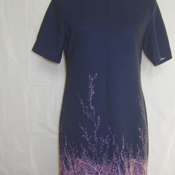 Women's Short Sleeve  Dress medium length, straight cut.