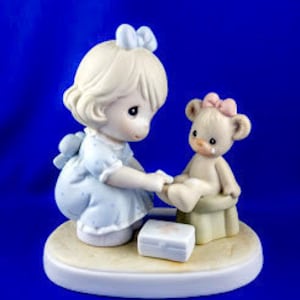 Caring Precious Moments Figurine