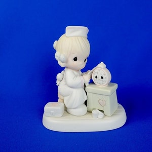 Time Heals Precious Moments Figurine
